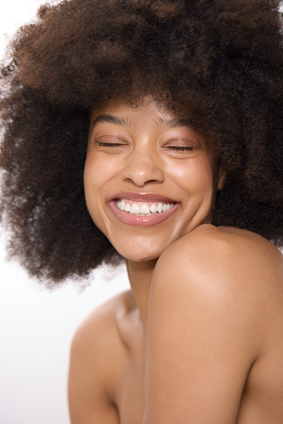 Beauty portrait, smiling over the shoulder