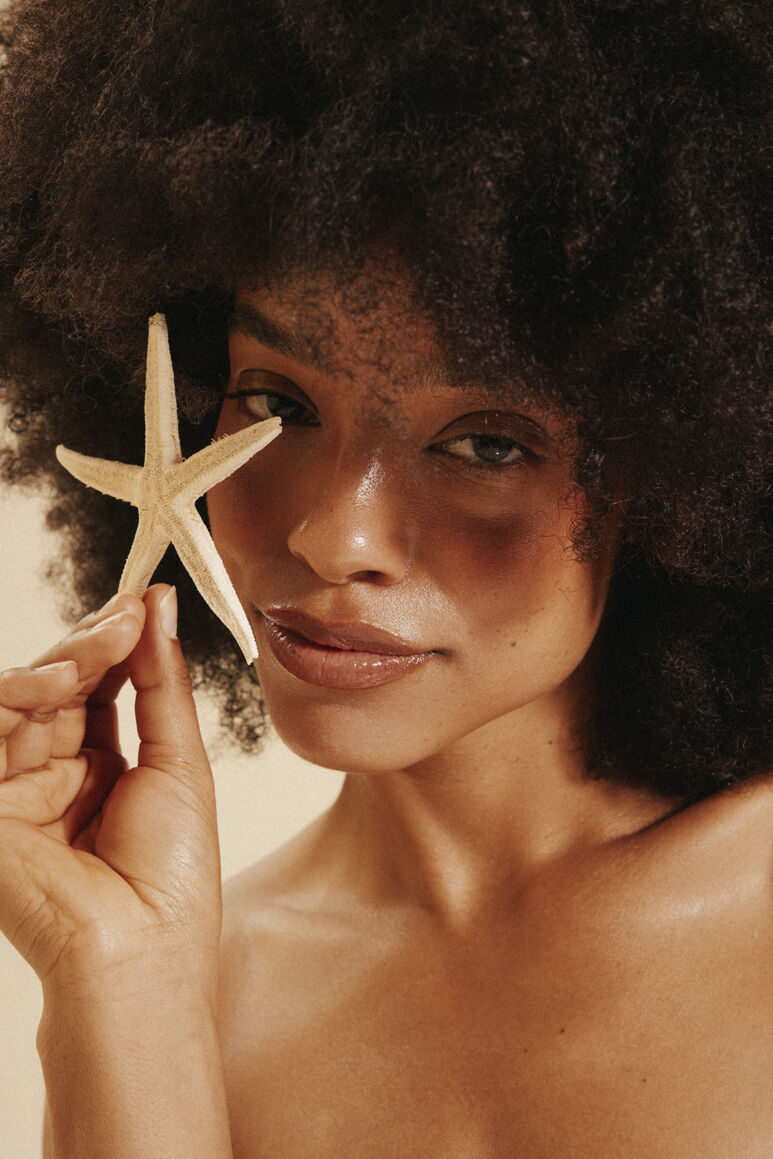 Beauty close-up portrait with starfish